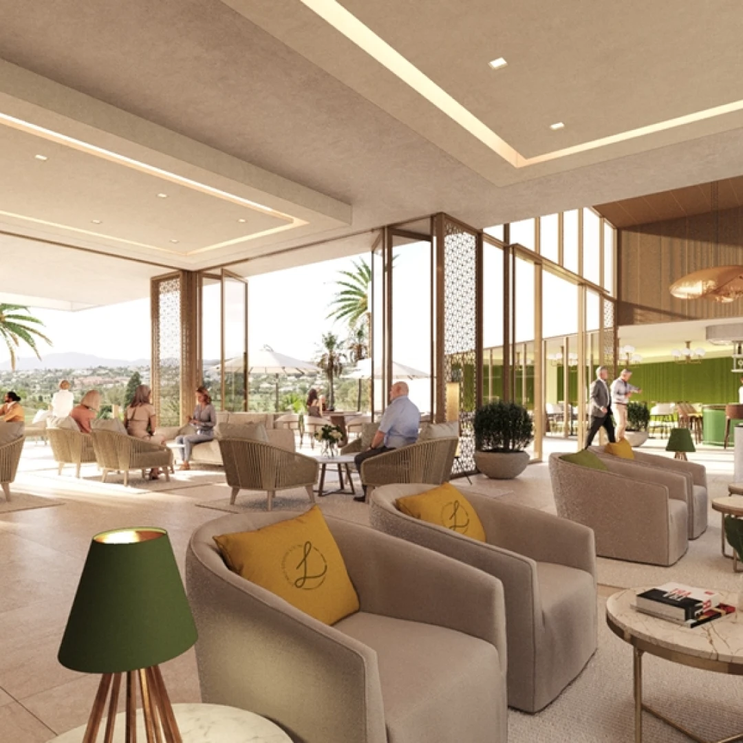Render de un lounge de hotel con butacas de mimbre y cojines amarillos con el monograma "L"