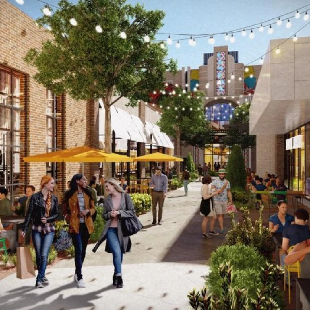 Render de una calle comercial peatonal con guirnaldas de luces, sombrillas amarillas y gente paseando